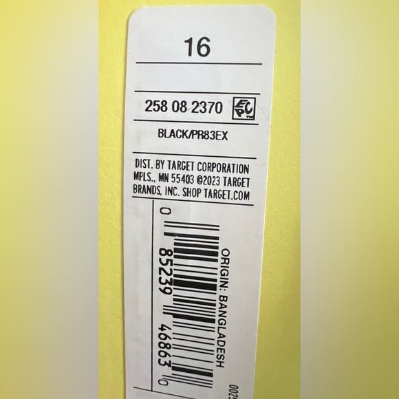 Sleeveless black mini dress with gold ring detailing - Picture 9 of 9